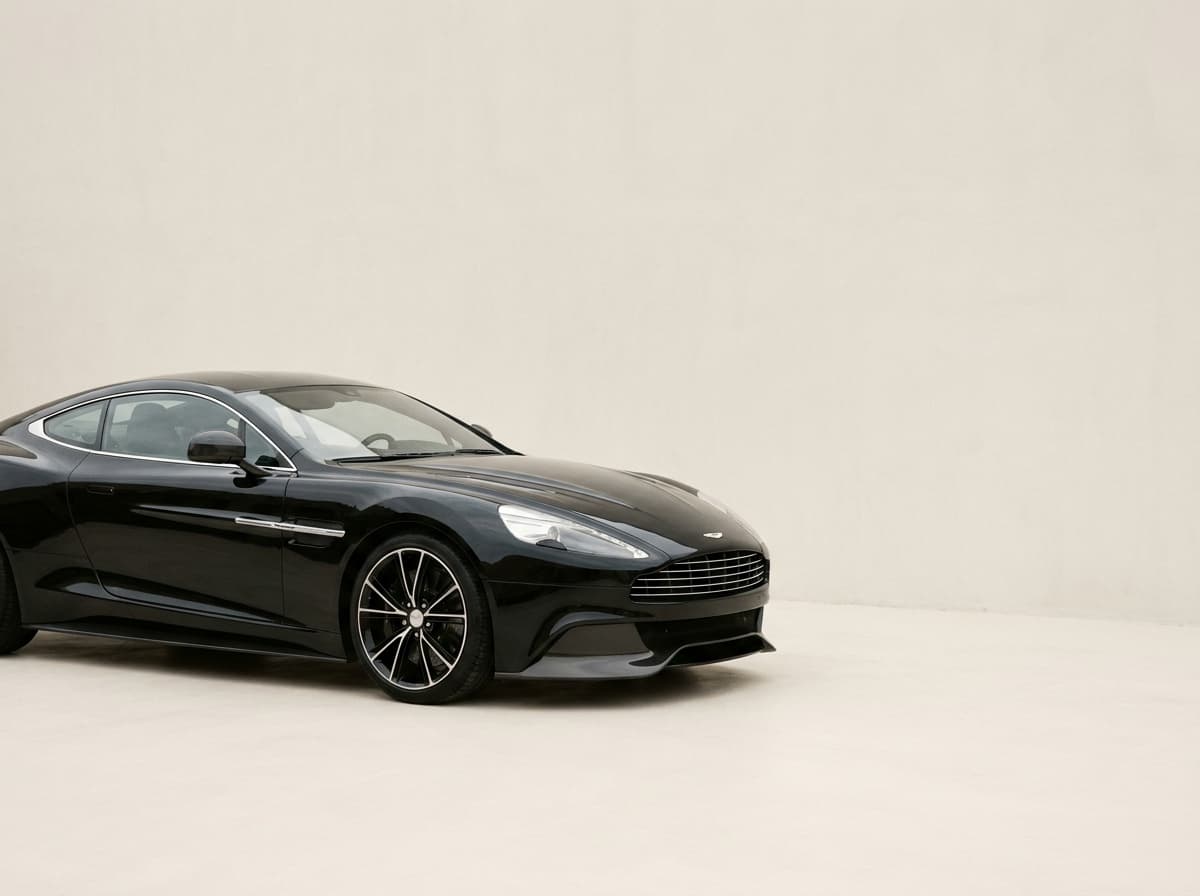 A black Aston Martin Vanquish photographed for a private sale